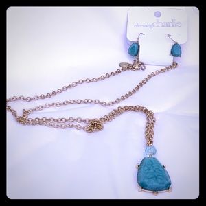 Turquoise and gold costume jewelry.